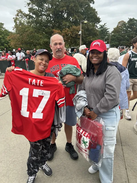 Roger and family tailgating before a football game